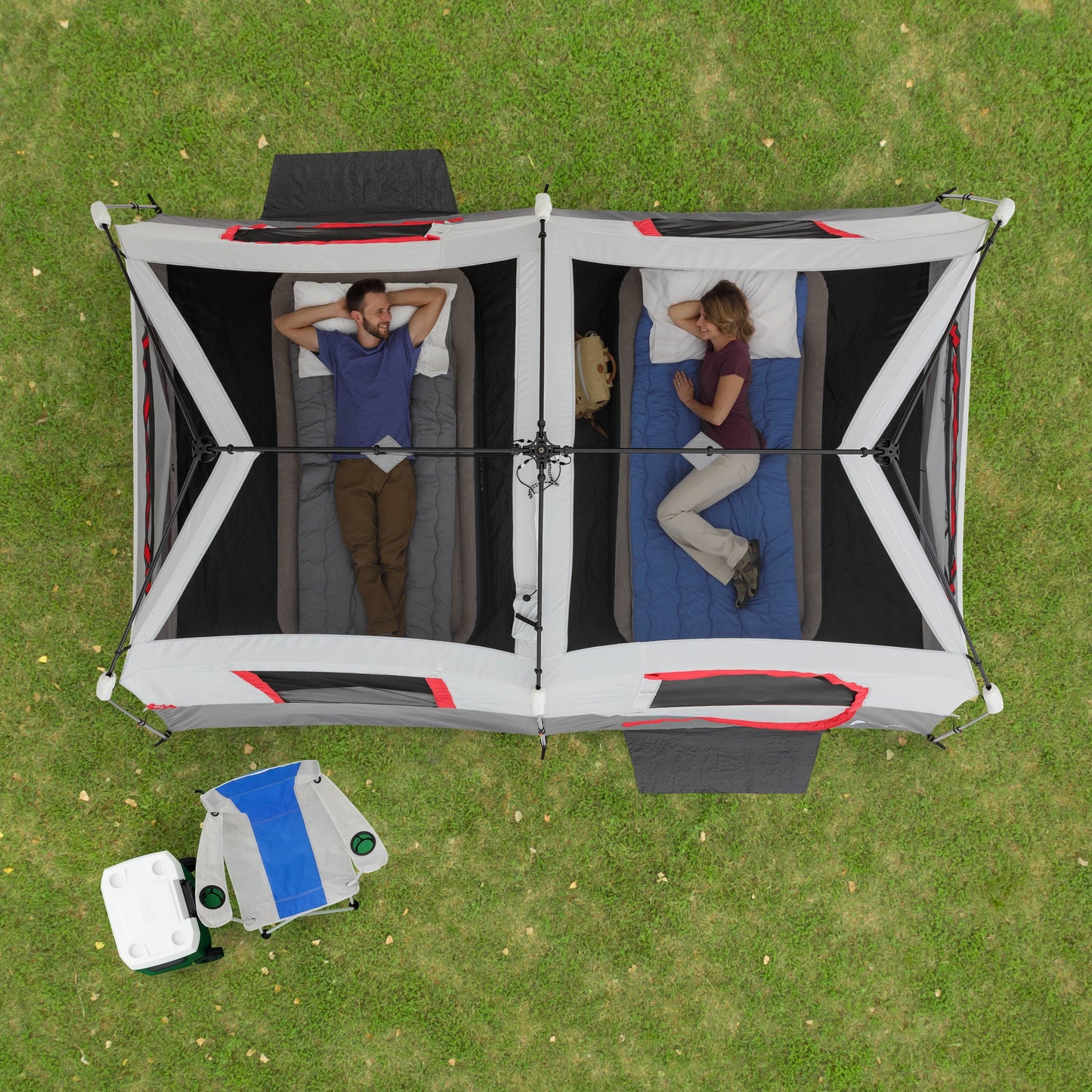 "8-Person Instant Cabin Tent set up in a campsite, showcasing its spacious interior, LED lighted poles, and durable design."
