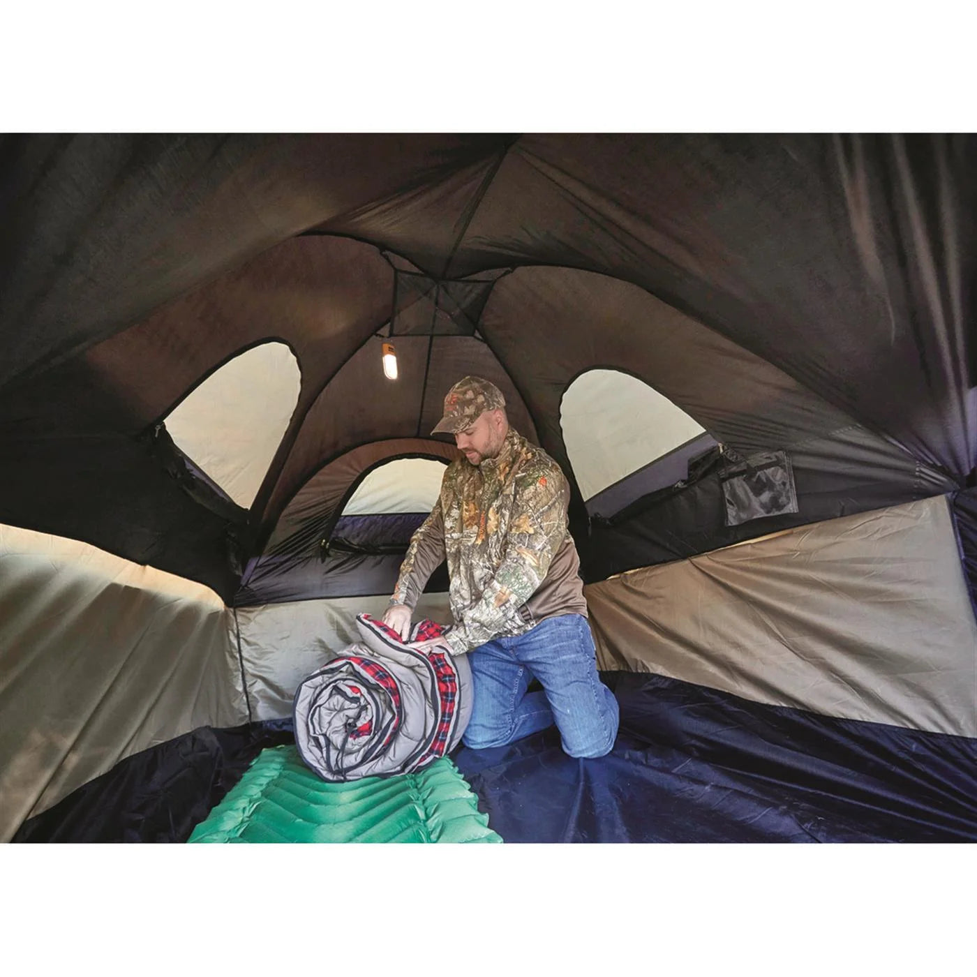 "Guide Gear Compact Premium Truck Tent set up on a truck bed, showcasing its spacious design and durable features."