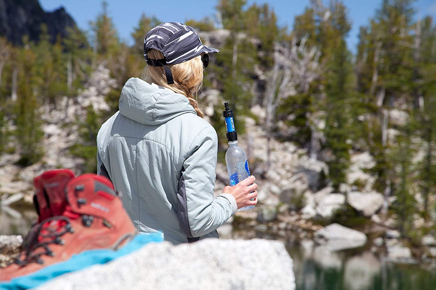 **Alt Text:**
Portable water filtration system, 4-pack. Lightweight, compact, and reliable for emergency preparedness, camping, and outdoor adventures.