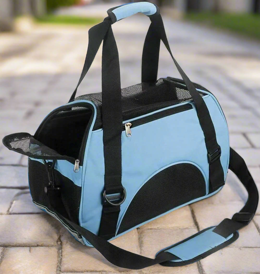 Blue airline-approved soft-sided pet carrier with a breathable design, removable mat, and multifunctional storage pockets for small pets.