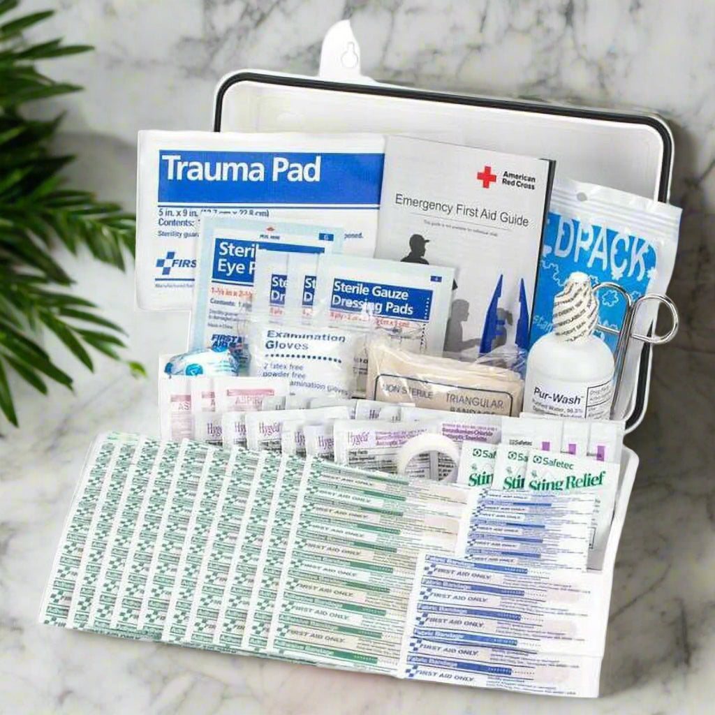 "Compact OSHA-Compliant First Aid Kit with handle, showcasing its weatherproof design and organized medical supplies."