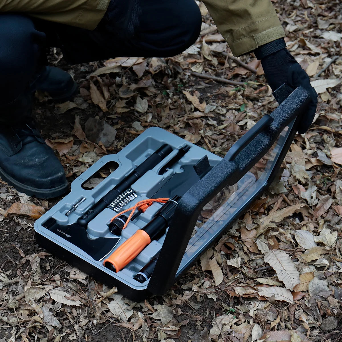 Image of a Survival Kit with a 15.35" high-carbon steel folding shovel, featuring a compact design, multi-tool functionality, and a durable hard case, ideal for emergency preparedness and outdoor use, displayed on a clean white background.