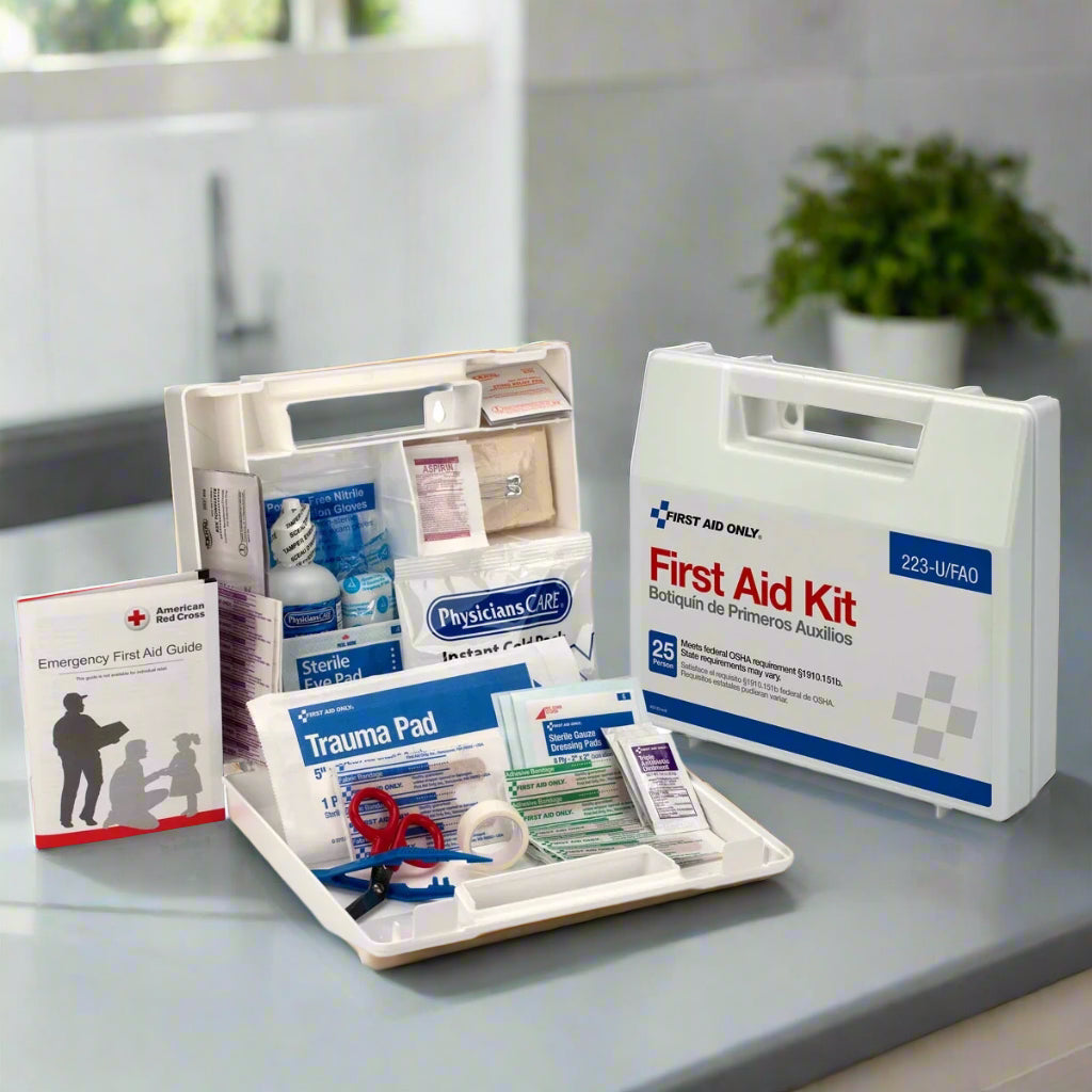 "ANSI-Compliant 107-Piece First Aid Kit displayed with medical supplies, showcasing its compact and organized design."