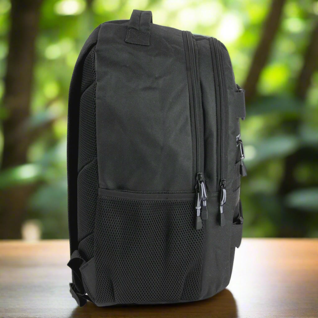 Heavy Duty 19 Inch Dual Compartment Laptop Backpack in black, featuring spacious compartments, skateboard straps, and a durable design. Perfect for carrying laptops, books, and gear for work, school, travel, or outdoor adventures.