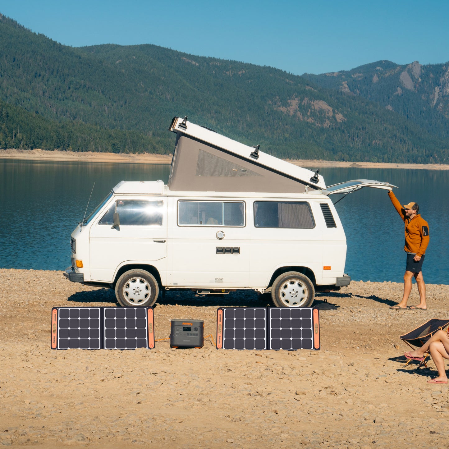 Portable solar generator with 3000W capacity, 2x 100W waterproof solar panels, and a wheeled design. Ideal for camping, emergencies, and off-grid power needs.