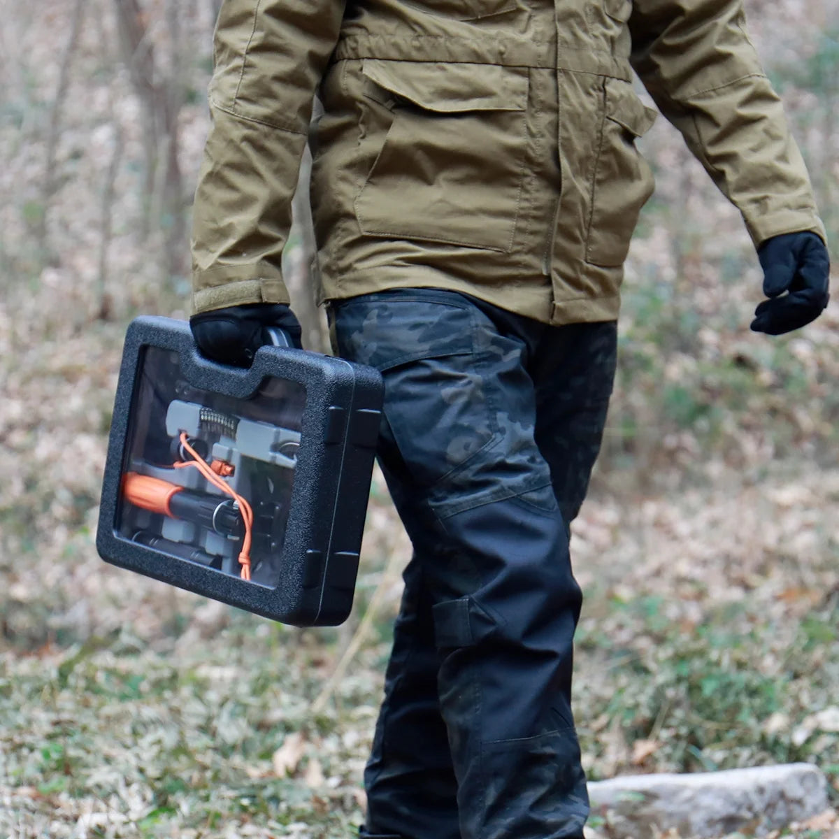 Image of a Survival Kit with a 15.35" high-carbon steel folding shovel, featuring a compact design, multi-tool functionality, and a durable hard case, ideal for emergency preparedness and outdoor use, displayed on a clean white background.