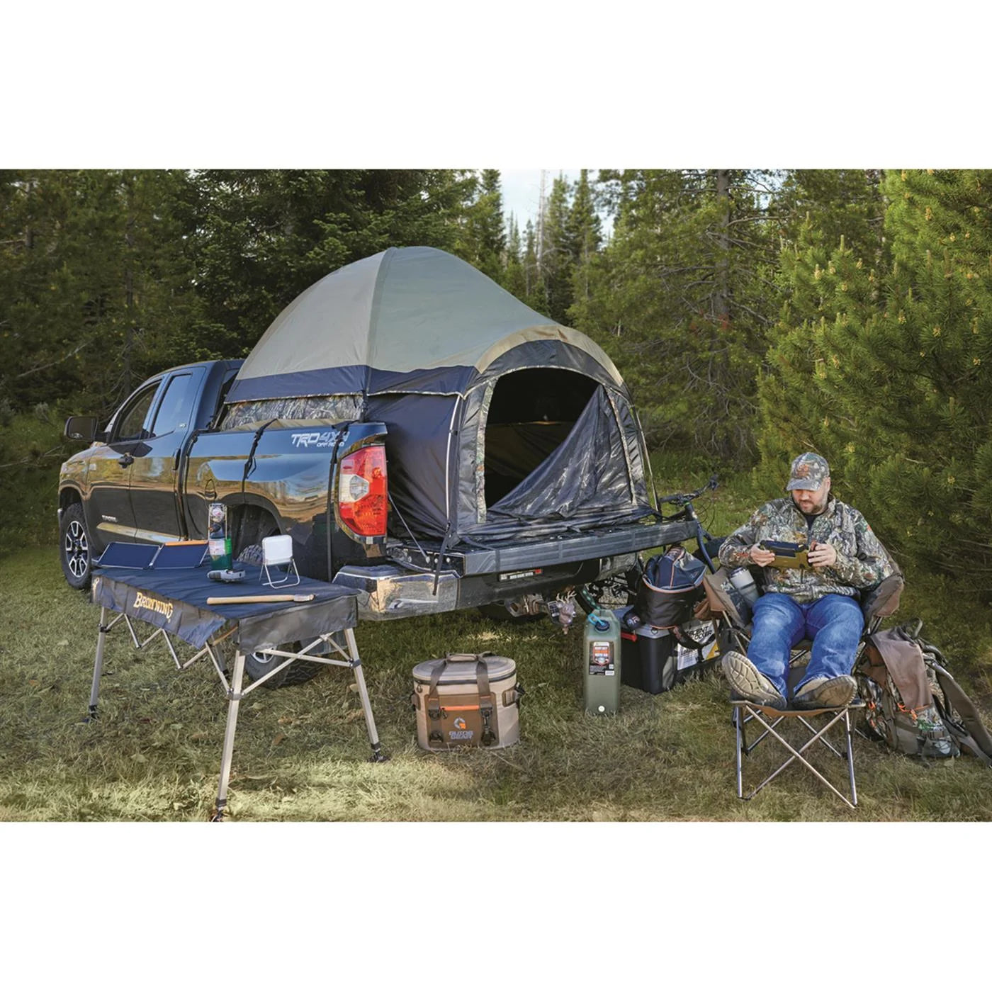 "Guide Gear Compact Premium Truck Tent set up on a truck bed, showcasing its spacious design and durable features."