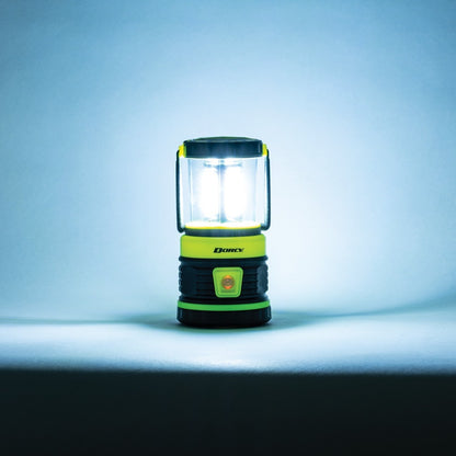 Image of the Dorcy 1800 Lumens Portable Camping Lantern featuring high brightness, multiple light modes, and a USB charging port, ideal for outdoor adventures and emergency preparedness, displayed on a clean white background.
