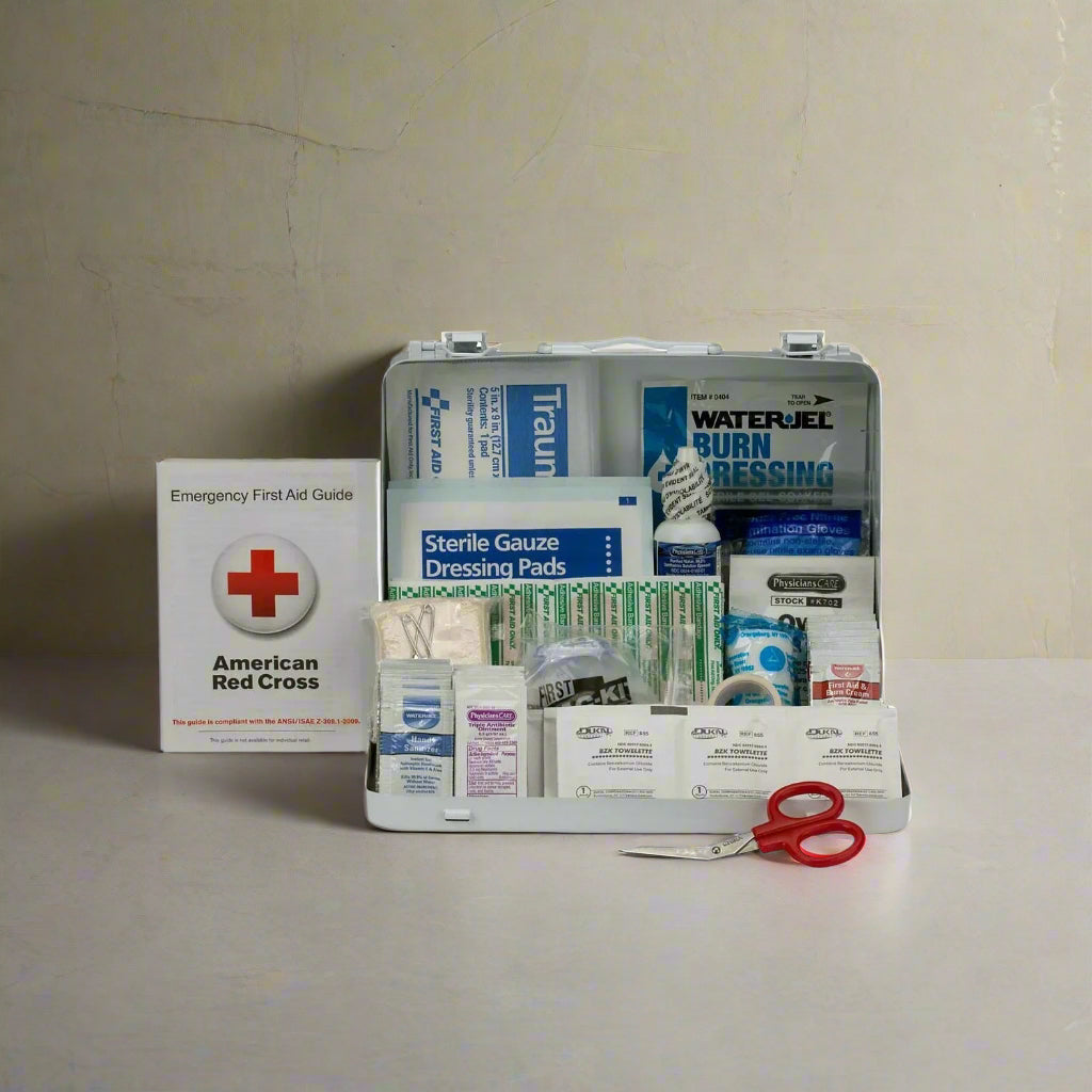 "Class A 25-Person First Aid Kit in a durable metal case, wall-mounted, showcasing its weatherproof design and organized supplies."
