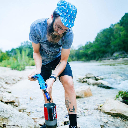 **Alt Text:**  
Portable water filtration system, 4-pack. Lightweight, compact, and reliable for emergency preparedness, camping, and outdoor adventures.

