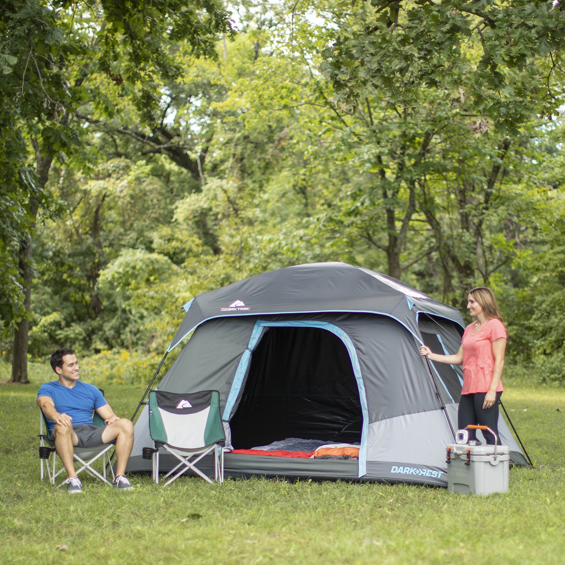 "6-Person Cabin Tent with Skylight set up at a campsite, showcasing its spacious interior and sun-blocking technology."
