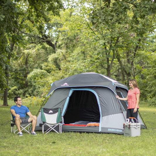 "6-Person Cabin Tent with Skylight set up at a campsite, showcasing its spacious interior and sun-blocking technology."
