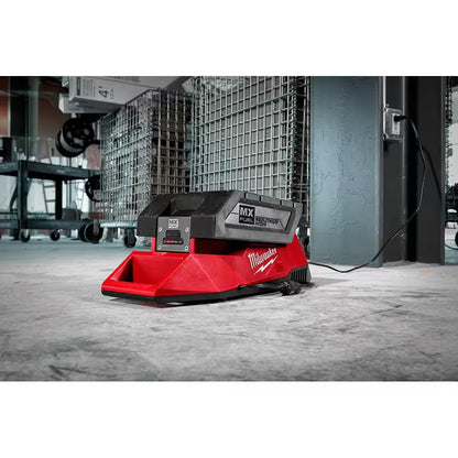 Image of the MX FUEL 3600W/1800W Portable Battery Generator with 2 XC batteries and a charger, showcasing a compact design with an integrated carry handle, displayed on a clean white background.
