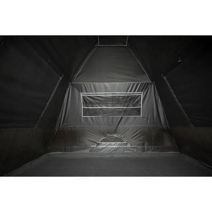 "6-Person Cabin Tent with Skylight set up at a campsite, showcasing its spacious interior and sun-blocking technology."
