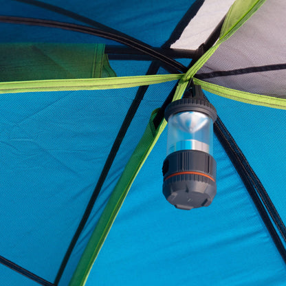 "10-Person Modified Dome Tent with Screen Porch set up in a forest campsite, showcasing its spacious design and inviting screen porch."
