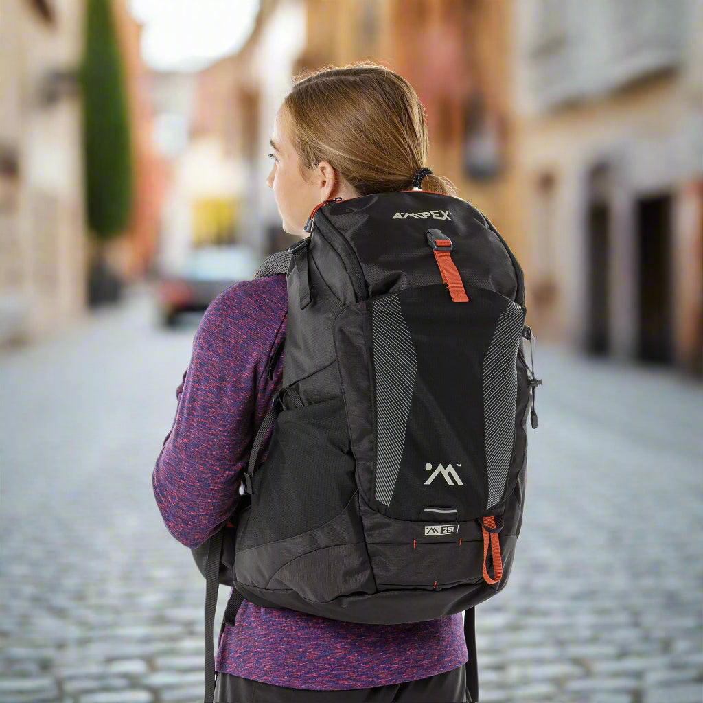 AMPEX Cahill 25L Lightweight Hiking Backpack in black, featuring a compact 25L capacity, hydration bladder compatibility, and adjustable straps for comfort. Includes a ventilated mesh back panel, perfect for hiking, nature walks, and outdoor adventures.